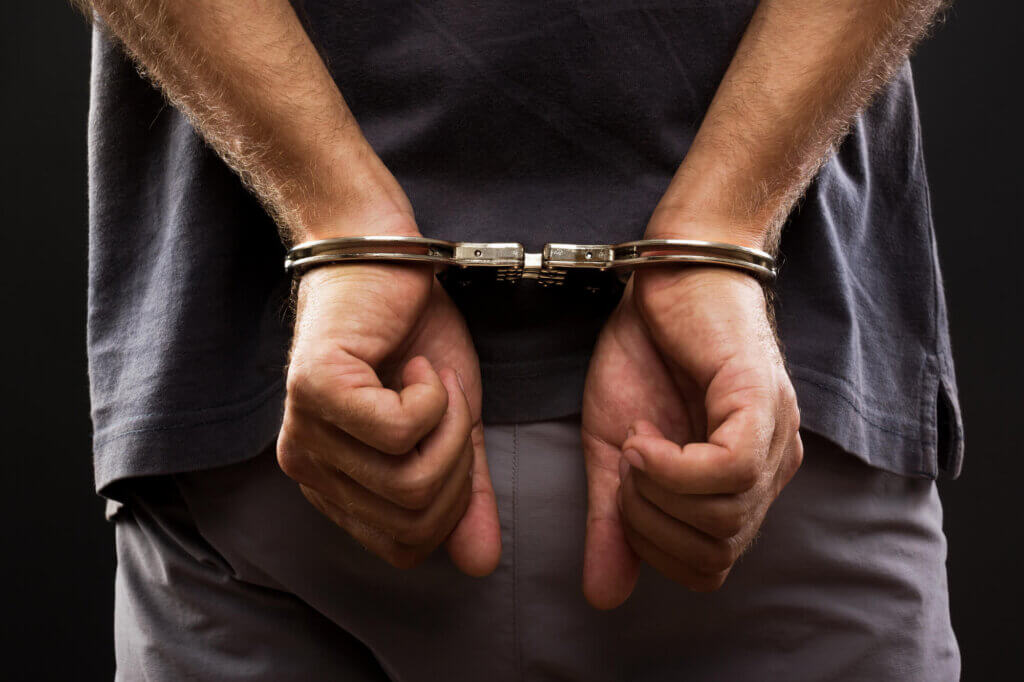 arrested man in handcuff